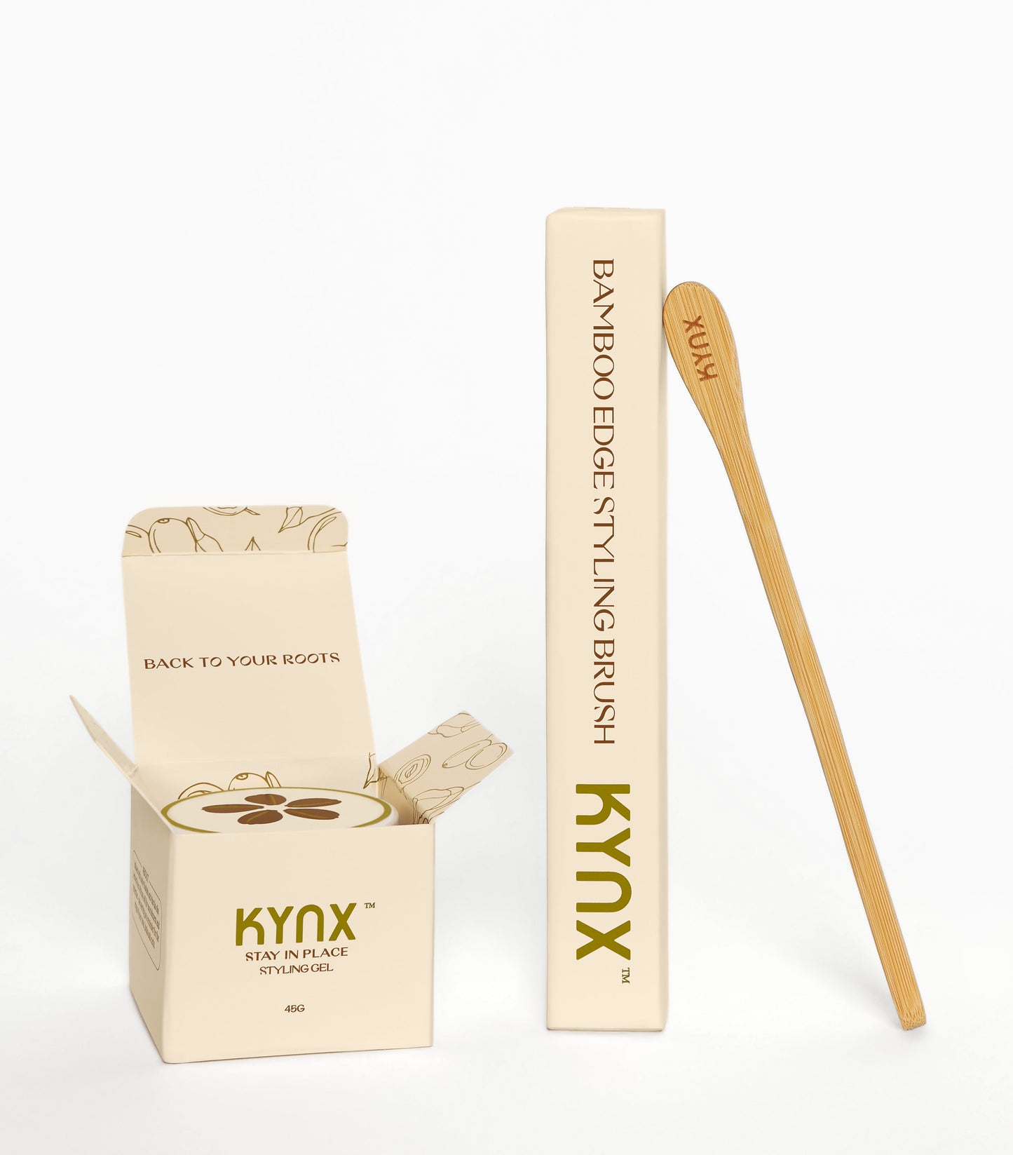 A toothbrush made of bamboo, with its packaging, on a white background. The packaging has the brand name 'KYNX' printed on it.